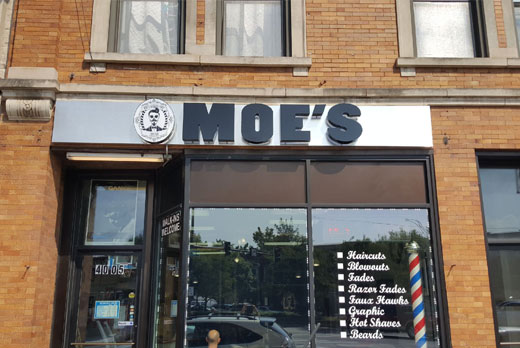Neon sign in image featuring NeonArts barbershop moes channel letters