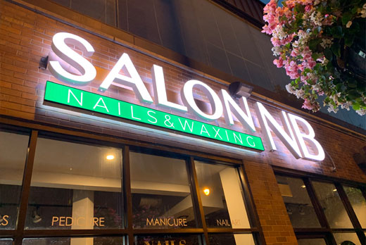 Neon sign featuring salon neon brand sign