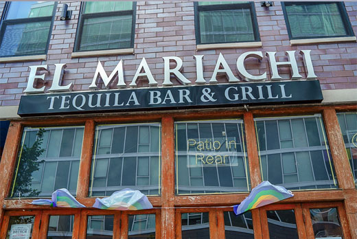 Neonarts patio in rear mariachi sign in white for sign