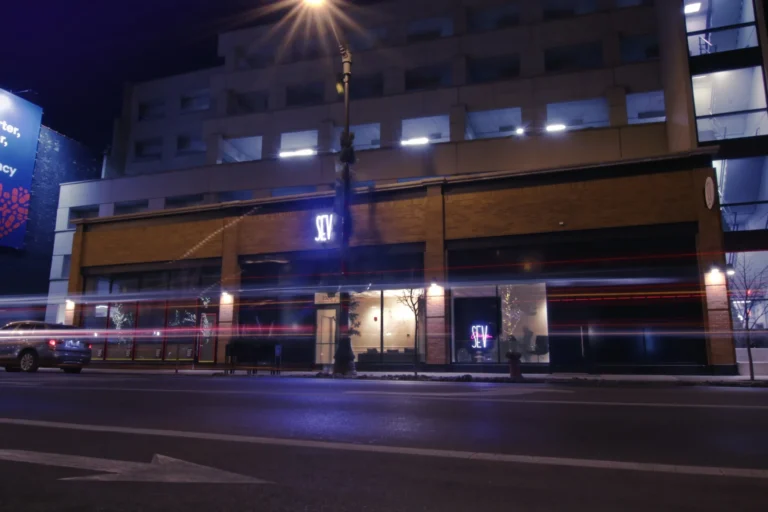 Neon sign featuring sev1 sign
