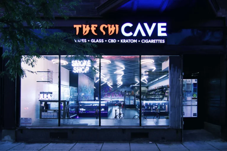 The Chi Cave Smoke Shop Signage in vibrant LED neon