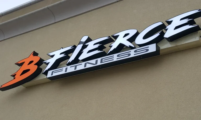 Bold 'B Fierce Fitness' signage on beige wall