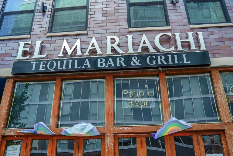 Neonarts patio in rear mariachi sign in white for sign